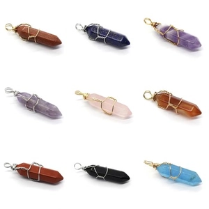Detailed grid of hexagonal crystal point pendants wrapped in decorative metal wire