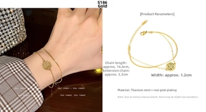 Detail view of gold double-layer pearl bracelet with dimensions and lucky charm charm