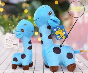 Blue plush giraffe toy detail showing soft material and attached product tag