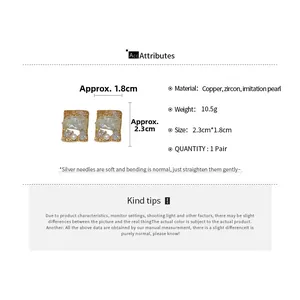 Detail of square gold plated earrings featuring zircon and pearl with dimension markers