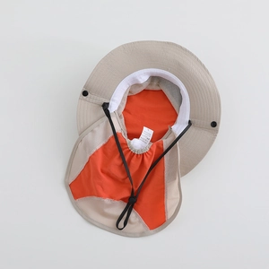 Detailed view of kids breathable sun hat with khaki mesh and orange inner lining