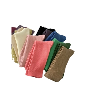 Colorful cotton knit crew socks in various summer solid tones with ribbed texture design