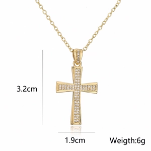 Detail showing cross pendant dimensions 3.2cm by 1.9cm and weight 6g in 18K gold plating