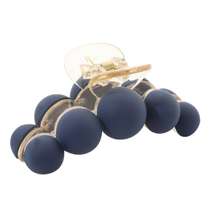 Deep blue beaded matte shark hair clip with transparent base on white background