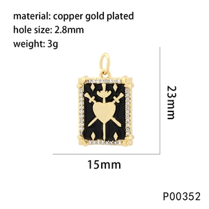 Detail of 18K gold plated heart pendant with 3 of swords tarot motif and zircon inlay