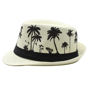 Detail of beige straw fedora featuring a black ribbon and tropical palm tree pattern