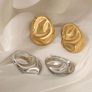 Irregular textured 316 stainless steel earrings in gold and silver finish