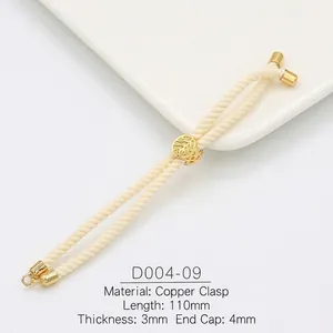 Macro detail of 3mm braided Milan cord with 18k gold plated copper clasp and specs