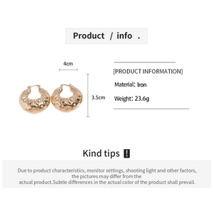 Detailed view of 18K gold plated hammered texture hoop earrings with size measurements