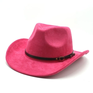 Detail of rose red western cowboy hat with black leather band and golden buckle accents
