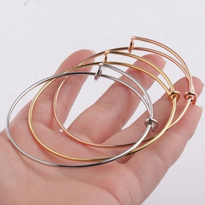 Adjustable stainless steel wire bracelets in silver, gold, and rose gold finishes