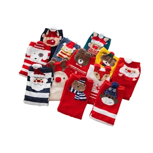 Assorted festive Christmas socks with 3D cartoon reindeer and Santa patterns in bright colors