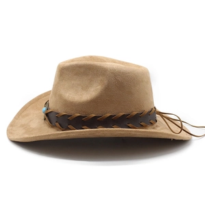 Detail of camel faux suede cowboy hat with braided leather band and turquoise bead