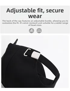 Close-up of the adjustable silver metal buckle on the black cotton baseball cap back