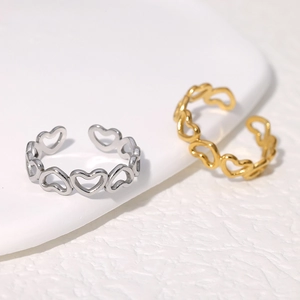 Polished hollow heart-shaped stainless steel open rings in gold and silver finish