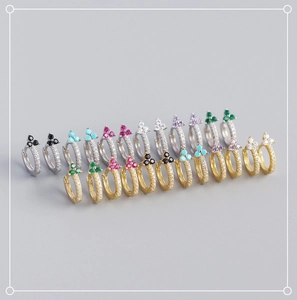 Detailed view of S925 silver hoop earrings with colorful zircon floral accents