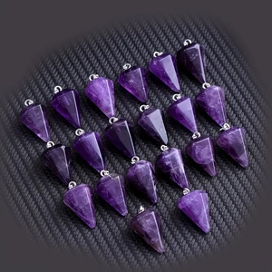 Detailed pattern of eighteen purple amethyst hexagonal prism pendants with silver bails