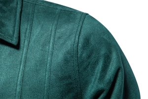 Detail of dark green suede jacket showing high-quality stitching and collar texture