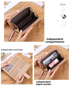 Detailed interior of pink long wallet showing card slots and zipper compartment