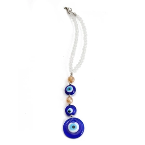 Detail of blue glass evil eye keychain with faceted beads and silver lobster clasp