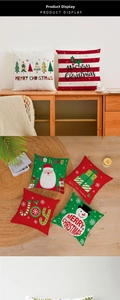 Close-up of red and black plaid Christmas pillow covers with festive tree patterns