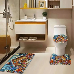 Three-piece festive Christmas bathroom mat set with gingerbread house and Santa Claus prints