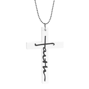 Close-up of wooden cross pendant with faith text on a silver ball chain necklace