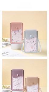 Detail of floral touch-screen crossbody phone bag with adjustable metal strap buckle