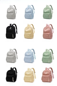 Corduroy backpacks in six colors and two sizes featuring a minimalist design