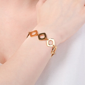 Élégant bracelet en acier inoxydable plaqué or 18 carats avec maillons carrés évidés