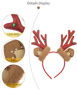 Detail display of glittery red antlers with green bells and soft artificial wool