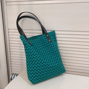 Retro green geometric print canvas tote bag with black leather handles and metal button