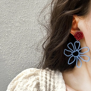 Elegant floral drop earrings with red resin rose and blue hollowed flower petals