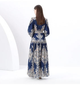 Rear view of vintage high-waist maxi dress with Baroque floral print and lantern sleeves