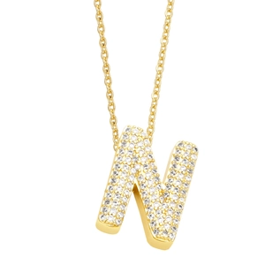 Detailed view of capital letter N pendant with pavé-set zircons on a gold chain