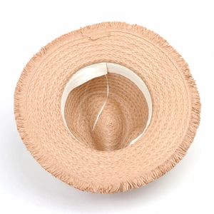 Women's straw sun hat with fringe brim and natural weave detail for beach vacations