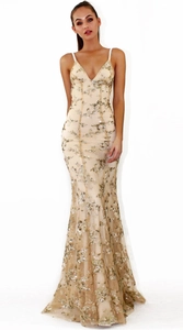 Detail of sequined champagne evening gown with deep V-neck and mermaid tail hem