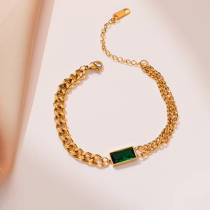 Titanium steel gold bracelet featuring a rectangular green gemstone with mixed chain links