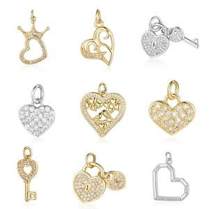 Selection of 9 copper and zircon heart-shaped key pendants in gold and silver finishes
