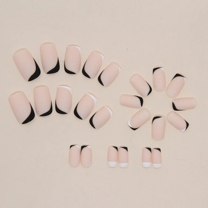 Matte halflange kunstnagels met zwart-wit gesplitst French tip ontwerp voor dames.