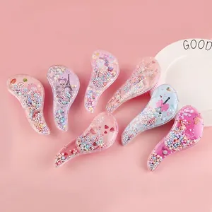 Set of 7 colorful transparent detangling hair brushes with cartoon unicorn designs