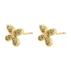 Detailed macro view of gold four-leaf clover stud earrings with sparkling clear crystals