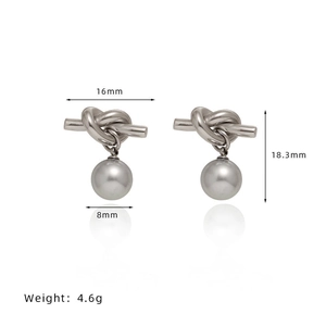 Detail shot of silver knot pearl earrings with precise dimensions and weight specs