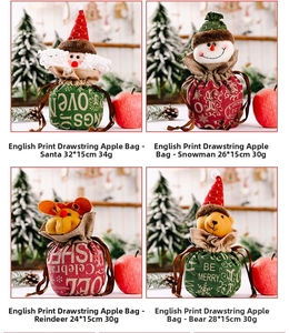Detailed view of Christmas burlap gift bags with Santa, Reindeer, and Snowman designs