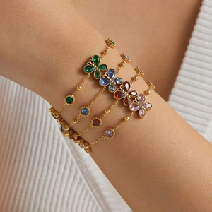 Elegant gold-plated stainless steel butterfly bracelet with colorful zircon stones on wrist