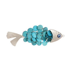Fish-shaped hair clip with blue scales and an evil eye bead on a silver metal base