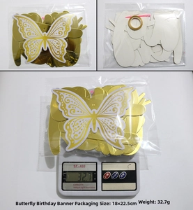 Detail of gold mirror paper butterfly banner showing 18x22.5cm size and 32.7g weight