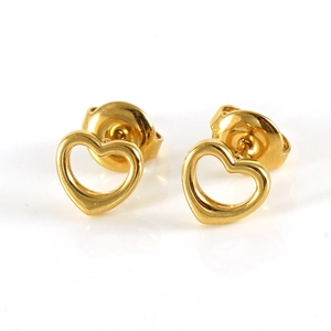 Close-up of golden hollow heart stud earrings with butterfly backings on white background