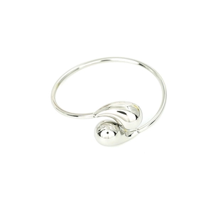 Polished silver open cuff bracelet featuring asymmetrical teardrop and ball ends