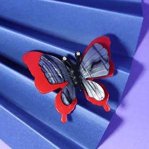 Chic layered acrylic butterfly brooch in red and marbled grey for apparel and bags